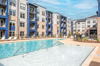 a swimming pool in front of an apartment building at Preston Ridge, North Carolina